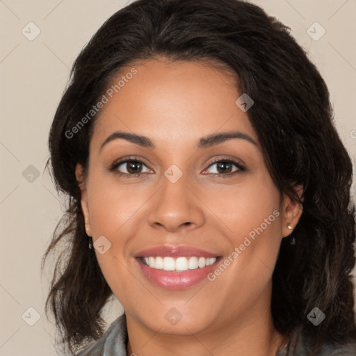 Joyful latino young-adult female with medium  brown hair and brown eyes