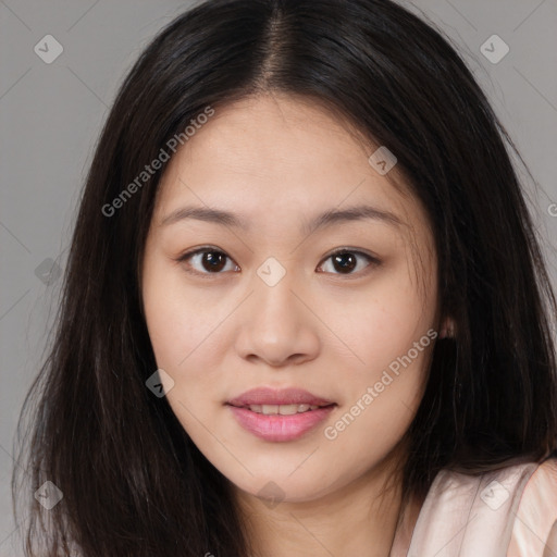 Joyful asian young-adult female with long  brown hair and brown eyes