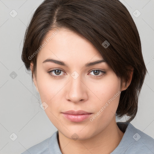 Neutral white young-adult female with medium  brown hair and brown eyes