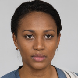 Neutral black young-adult female with short  brown hair and brown eyes