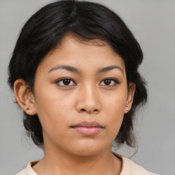 Neutral asian young-adult female with medium  black hair and brown eyes