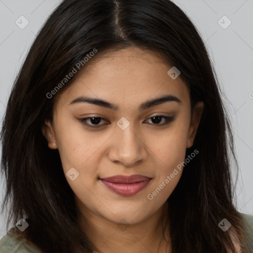 Joyful asian young-adult female with long  brown hair and brown eyes