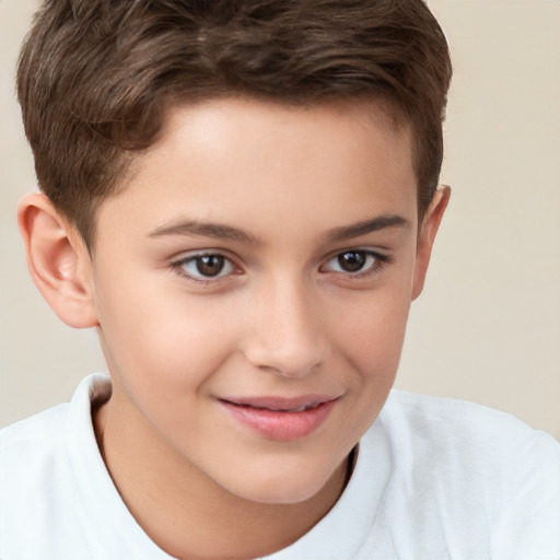 Joyful white child male with short  brown hair and brown eyes