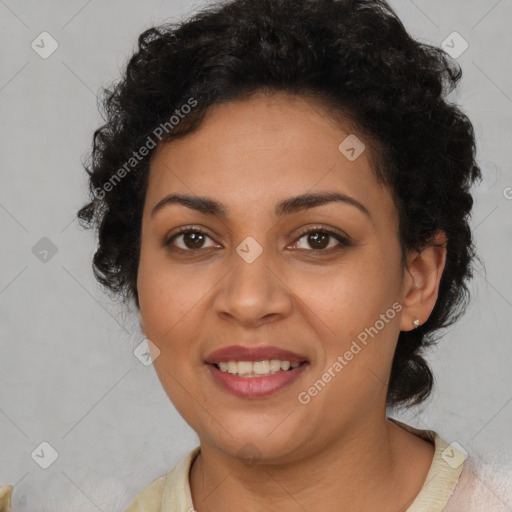 Joyful latino young-adult female with short  brown hair and brown eyes