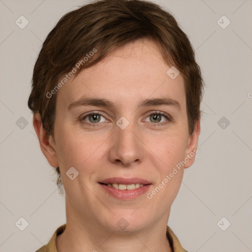 Joyful white young-adult female with short  brown hair and grey eyes