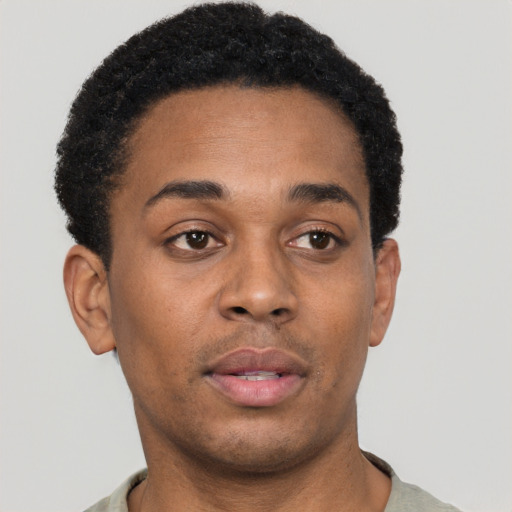 Neutral black young-adult male with short  brown hair and brown eyes