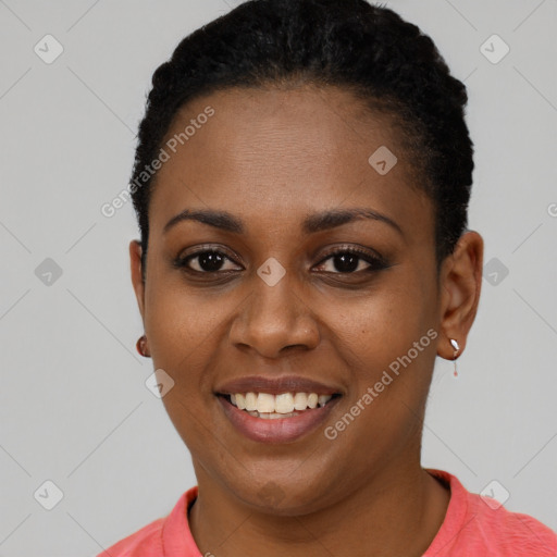 Joyful black young-adult female with short  black hair and brown eyes