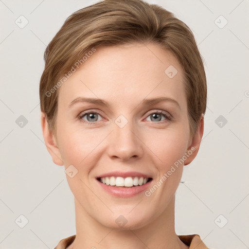 Joyful white young-adult female with short  brown hair and grey eyes