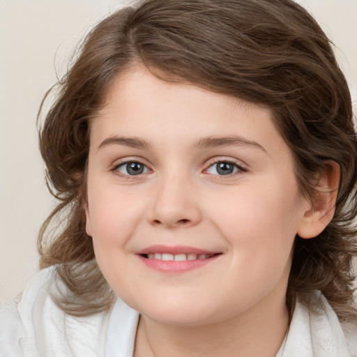 Joyful white child female with medium  brown hair and brown eyes