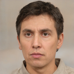 Neutral white adult male with short  brown hair and brown eyes