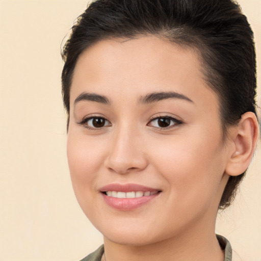 Joyful white young-adult female with medium  brown hair and brown eyes