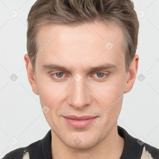 Joyful white adult male with short  brown hair and grey eyes