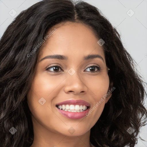 Joyful latino young-adult female with long  brown hair and brown eyes