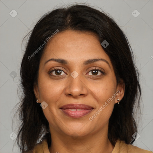 Joyful black young-adult female with medium  brown hair and brown eyes