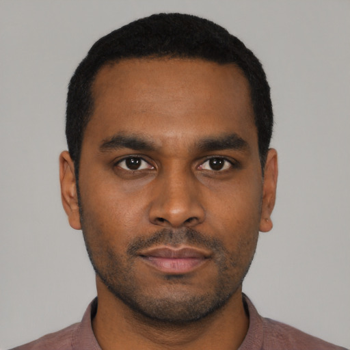 Neutral black young-adult male with short  black hair and brown eyes