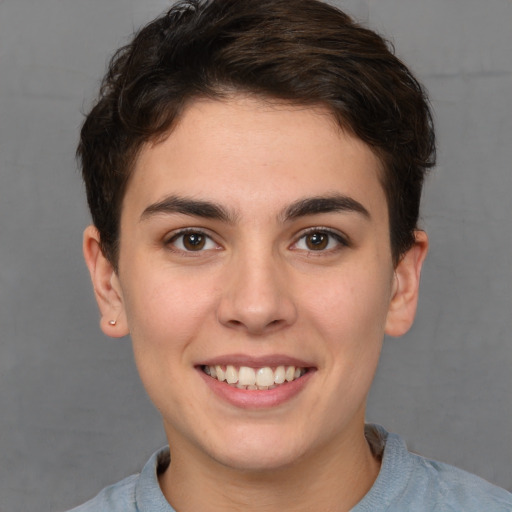 Joyful white young-adult female with short  brown hair and brown eyes