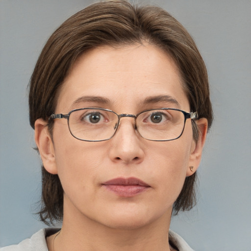 Neutral white adult female with medium  brown hair and brown eyes