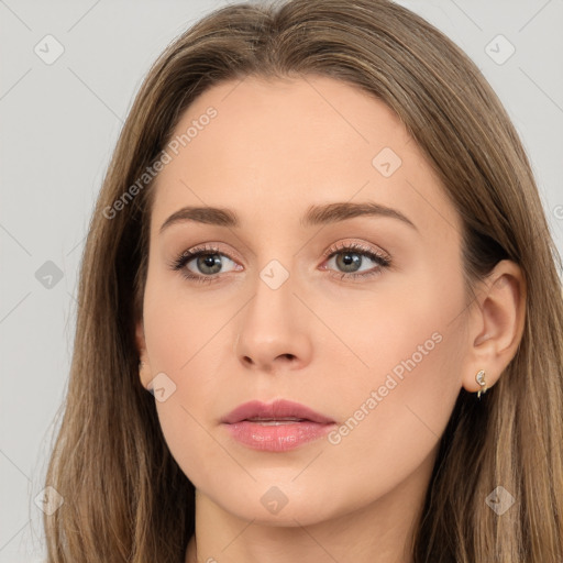 Neutral white young-adult female with long  brown hair and brown eyes