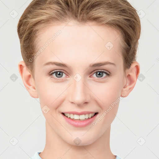 Joyful white young-adult female with short  brown hair and grey eyes