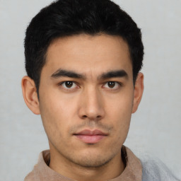 Neutral asian young-adult male with short  black hair and brown eyes