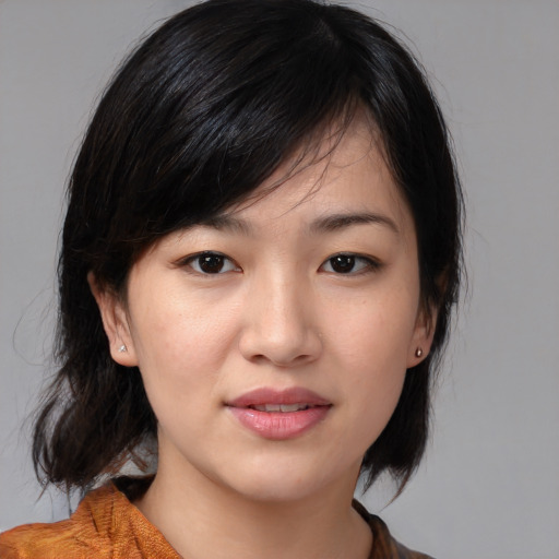Joyful white young-adult female with medium  black hair and brown eyes