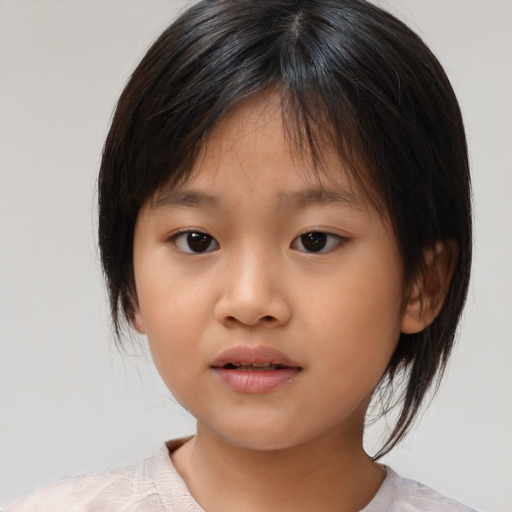 Neutral asian child female with medium  brown hair and brown eyes