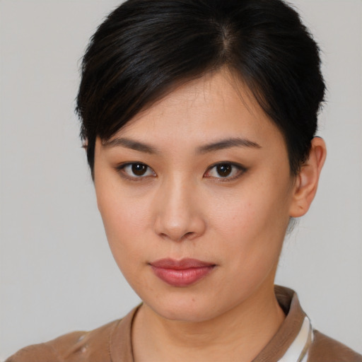 Neutral asian young-adult female with short  brown hair and brown eyes