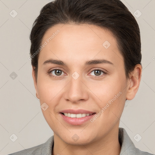 Joyful white young-adult female with short  brown hair and brown eyes