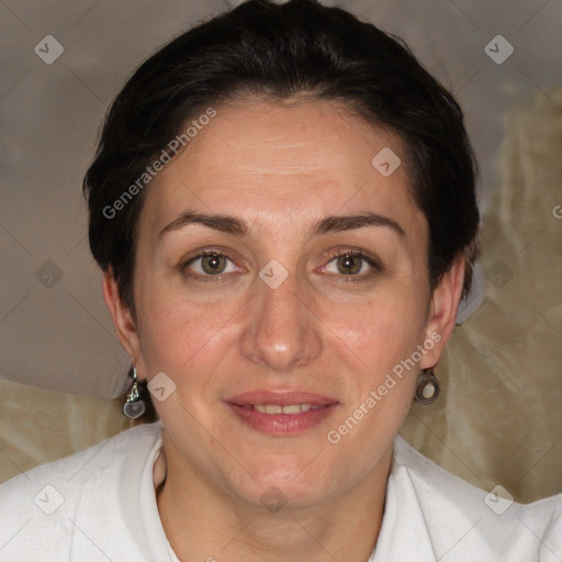 Joyful white adult female with short  brown hair and brown eyes