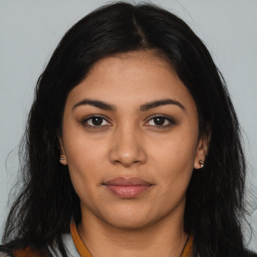 Neutral latino young-adult female with long  black hair and brown eyes