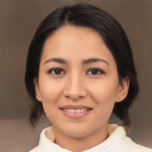 Joyful asian young-adult female with medium  brown hair and brown eyes