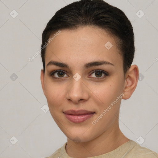 Joyful white young-adult female with short  brown hair and brown eyes