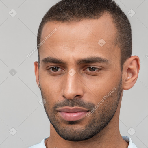 Neutral white young-adult male with short  brown hair and brown eyes