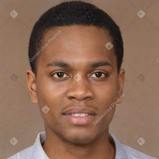 Joyful black young-adult male with short  brown hair and brown eyes