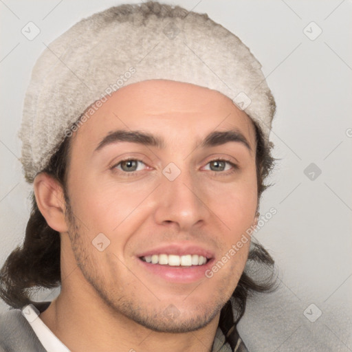 Joyful white young-adult male with short  black hair and brown eyes