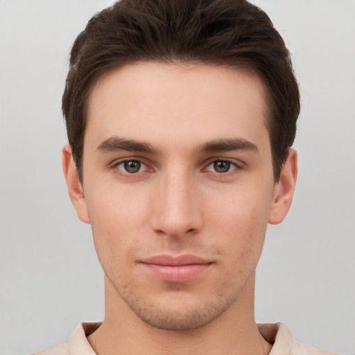 Neutral white young-adult male with short  brown hair and brown eyes