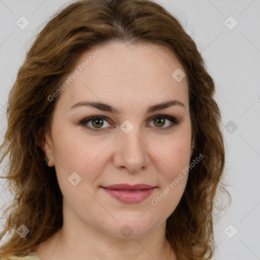 Joyful white young-adult female with medium  brown hair and green eyes