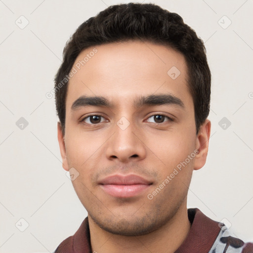 Neutral white young-adult male with short  black hair and brown eyes