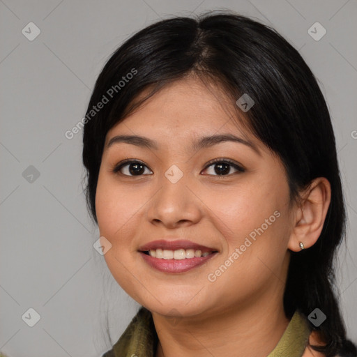 Joyful asian young-adult female with medium  black hair and brown eyes