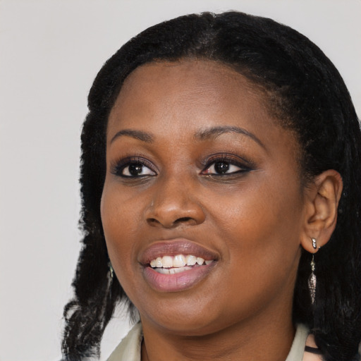 Joyful black young-adult female with medium  black hair and brown eyes