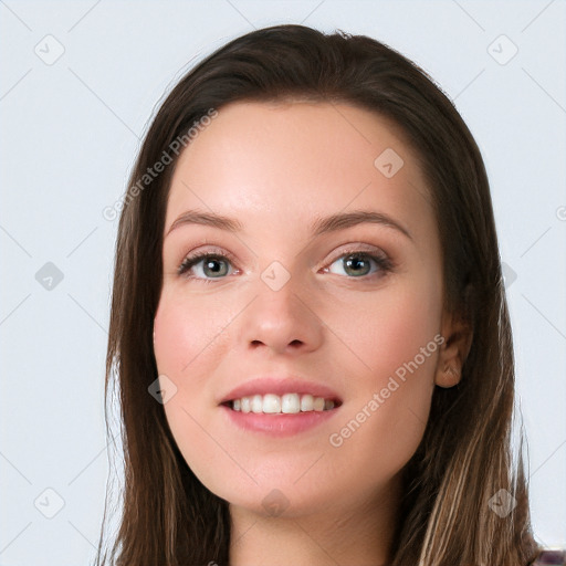 Joyful white young-adult female with long  brown hair and blue eyes