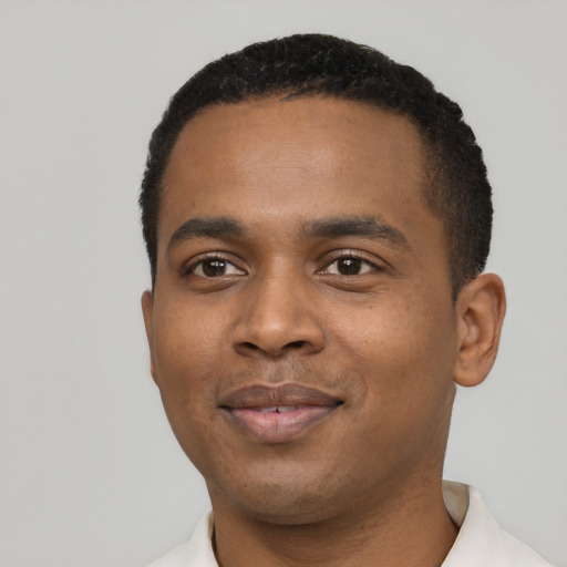 Neutral black young-adult male with short  black hair and brown eyes
