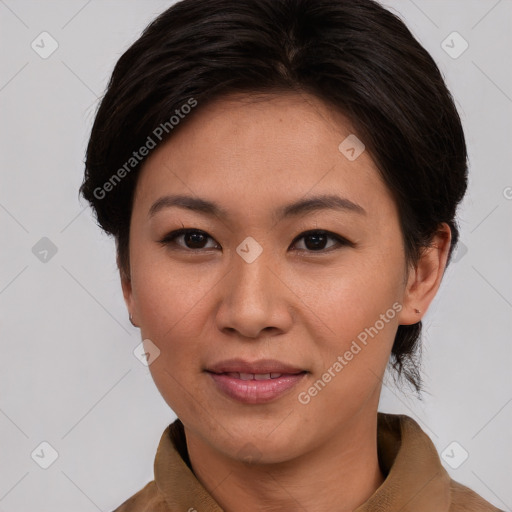 Joyful asian young-adult female with short  brown hair and brown eyes