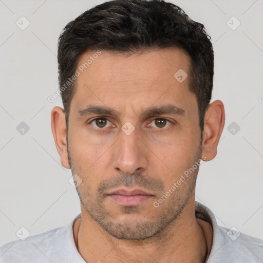 Neutral white adult male with short  black hair and brown eyes