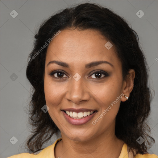 Joyful black young-adult female with medium  brown hair and brown eyes