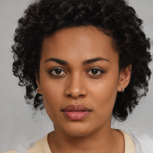 Neutral latino young-adult female with medium  black hair and brown eyes