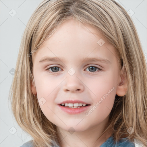 Joyful white child female with medium  brown hair and grey eyes