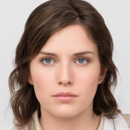 Neutral white young-adult female with medium  brown hair and grey eyes