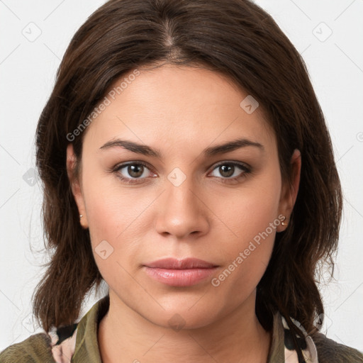 Neutral white young-adult female with medium  brown hair and brown eyes