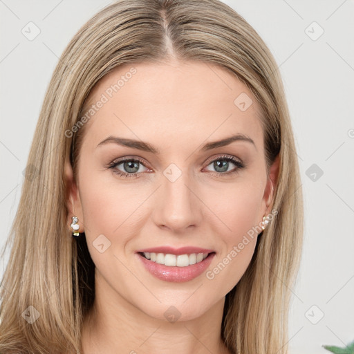 Joyful white young-adult female with long  brown hair and green eyes